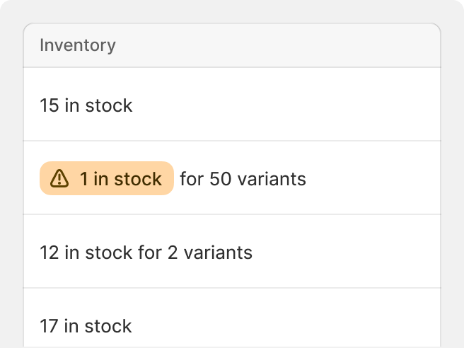 An orange badge with an alert icon and text label in a table column that indicates that an item is almost out of stock